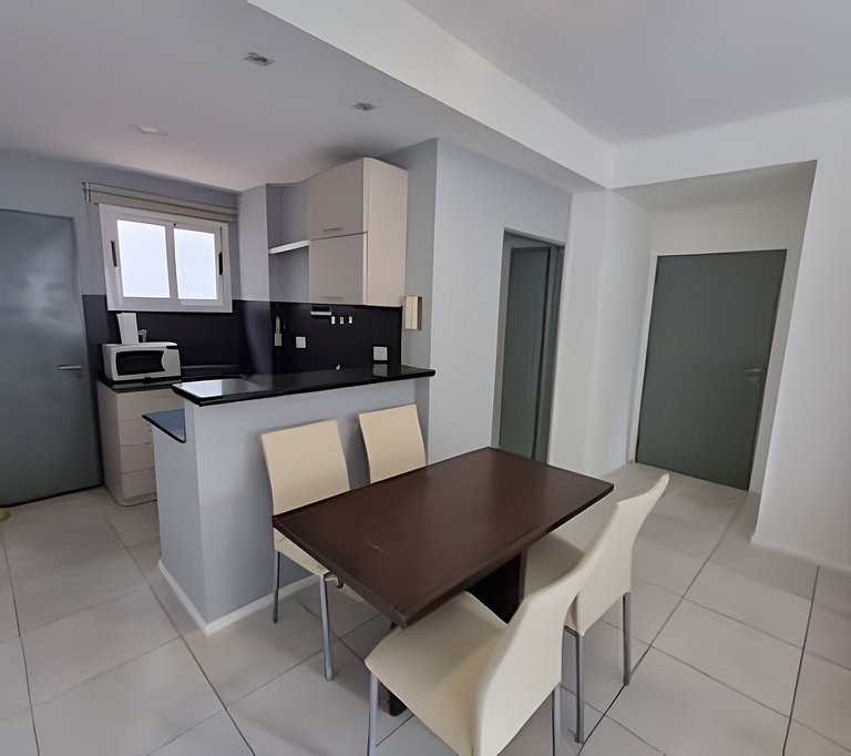 Moderno departamento con patio privado