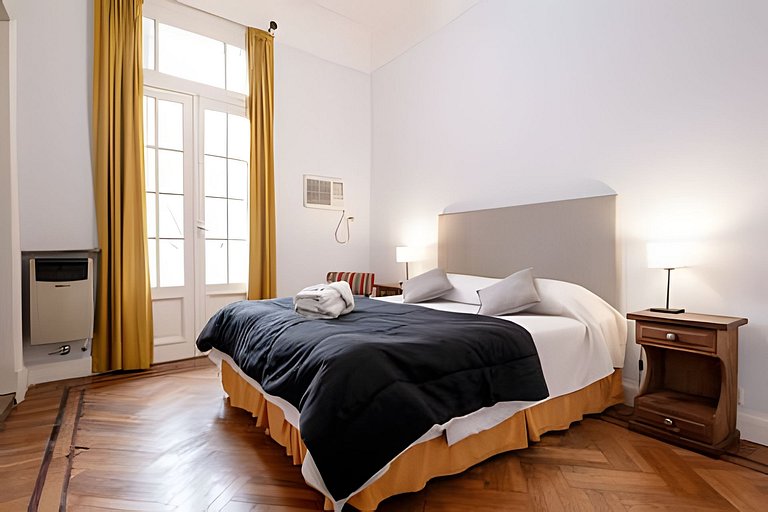 Spacious, classic, and elegant apartment with a balcony