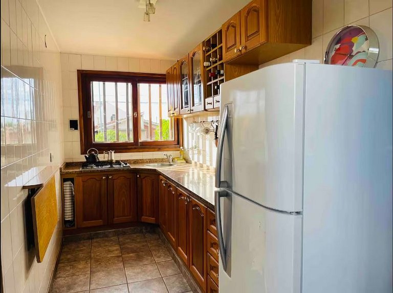 16 people - 2 houses - With grill and garage.