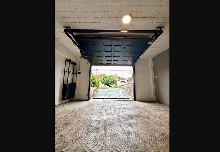 16 people - 2 houses - With grill and garage.