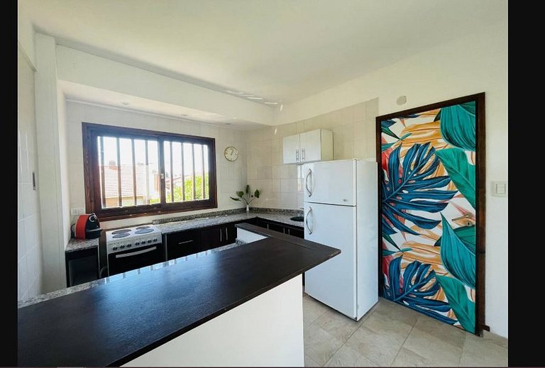 16 people - 2 houses - With grill and garage.