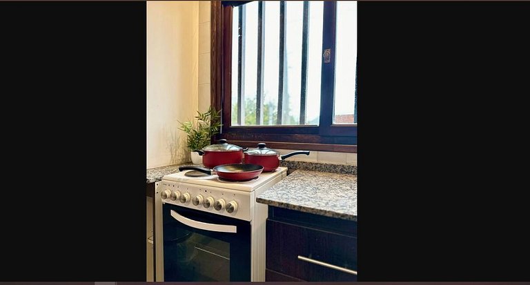 16 people - 2 houses - With grill and garage.